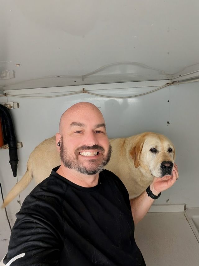 Paul with Tank the Lab after his bath